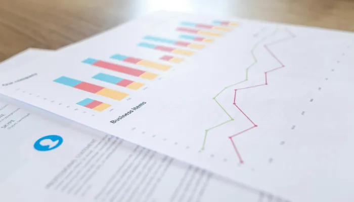 A report is laid across a table