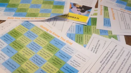 Lesson plans are laid across a table at a Tutor Trust workshop event