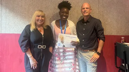 Salford Tutor of the Year, Esther Mashamba, receives her certificate